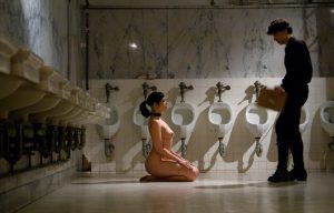 forced kneeling in toilet